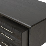Featuring Lauren Charcoal Oak Resawn Veneer Desk by Four Hands at Amethyst Home. Made from resawn oak and oak veneer, a legal-style desk offers major storage with dual cabinetry, including file storage for legal and letter-size documents. A floating top and iron legs keep the look modern and light. This piece is designed in collaboration with Thomas Bina. . Amethyst Home provides interior design, new home construction design consulting, vintage area rugs, and lighting in the Washington metro area.