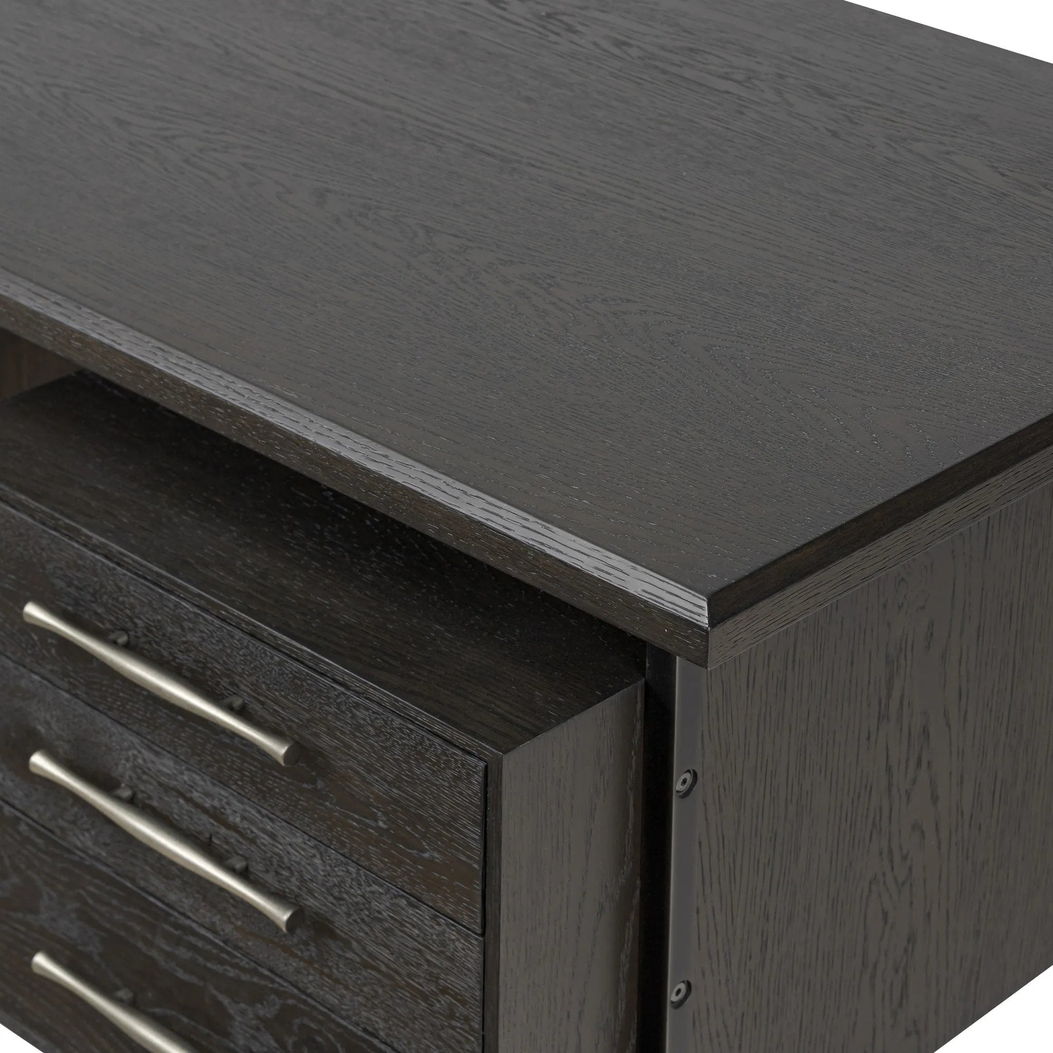 Featuring Lauren Charcoal Oak Resawn Veneer Desk by Four Hands at Amethyst Home. Made from resawn oak and oak veneer, a legal-style desk offers major storage with dual cabinetry, including file storage for legal and letter-size documents. A floating top and iron legs keep the look modern and light. This piece is designed in collaboration with Thomas Bina. . Amethyst Home provides interior design, new home construction design consulting, vintage area rugs, and lighting in the Washington metro area.
