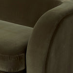 Lounge or entertain on this velvety bench-style sofa. The solid wood frame features a gentle curve at the front, while the olive performance fabric introduces rich, unexpected color to the living area. Performance fabrics are specially created to withstand spills, stains, high traffic and wear, ensuring long-term comfort and unmatched durability. Amethyst Home provides interior design, new home construction design consulting, vintage area rugs, and lighting in the Calabasas metro area.
