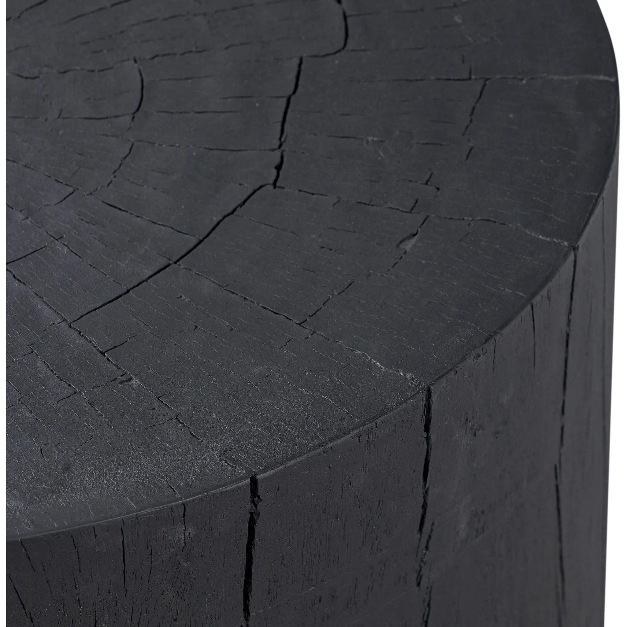 Ground any room with a style inspired by the beautiful simplicity of nature. Made of black-finished resin, the form for this special piece is molded from a tree trunk that's been cut into a circle, then cast in resin to recreate the same  texture of the trunk, even the saw marks where it was cut — talk about a true statement piece Amethyst Home provides interior design, new home construction design consulting, vintage area rugs, and lighting in the Alpharetta metro area.