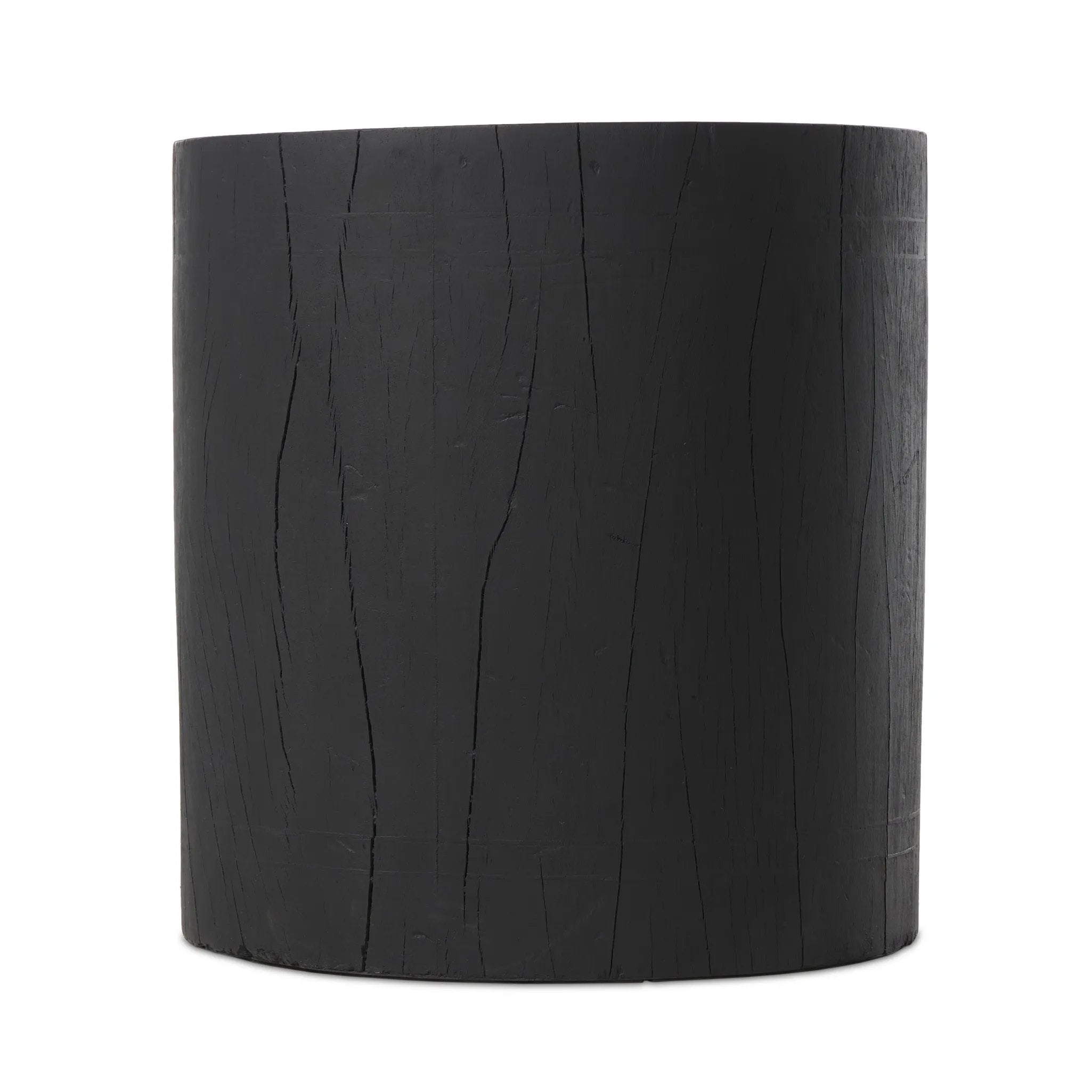 Ground any room with a style inspired by the beautiful simplicity of nature. Made of black-finished resin, the form for this special piece is molded from a tree trunk that's been cut into a circle, then cast in resin to recreate the same  texture of the trunk, even the saw marks where it was cut — talk about a true statement piece Amethyst Home provides interior design, new home construction design consulting, vintage area rugs, and lighting in the Dallas metro area.