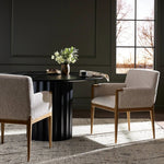 Featuring Ledger Somerton Ash Dining Chair by Four Hands at Amethyst Home. A box-profile dining chair that’s all about comfort. Exposed oak legs flow seamlessly into the chair's upholstered arms, for a seamless look. Performance fabrics are specially created to withstand spills, stains, high traffic and wear, ensuring long-term comfort and unmatched durab. Amethyst Home provides interior design, new home construction design consulting, vintage area rugs, and lighting in the Kansas City metro area.