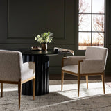 Featuring Ledger Somerton Ash Dining Chair by Four Hands at Amethyst Home. A box-profile dining chair that’s all about comfort. Exposed oak legs flow seamlessly into the chair's upholstered arms, for a seamless look. Performance fabrics are specially created to withstand spills, stains, high traffic and wear, ensuring long-term comfort and unmatched durab. Amethyst Home provides interior design, new home construction design consulting, vintage area rugs, and lighting in the Kansas City metro area.