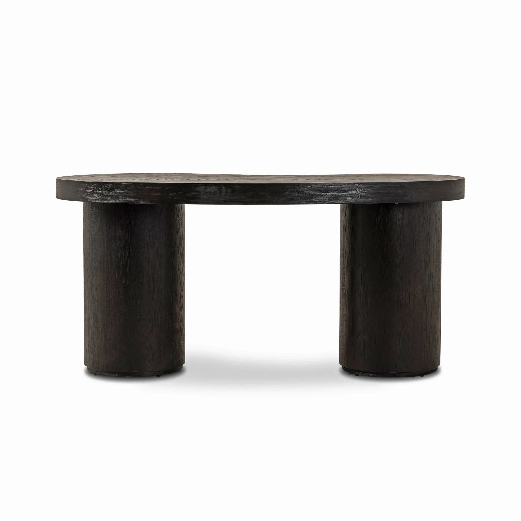 Featuring Leeds Ebony Veneer Desk by Four Hands at Amethyst Home. Substantial cylindrical legs support a kidney-shaped desk crafted in light black-finished oak veneer — a testament to form harmonizing with function.Overall Dimensions: 63.00"w x 31.50"d x 30.00"hWeight : 127.87 lbsMaterials: Oak Veneer. Amethyst Home provides interior design, new home construction design consulting, vintage area rugs, and lighting in the Austin metro area.