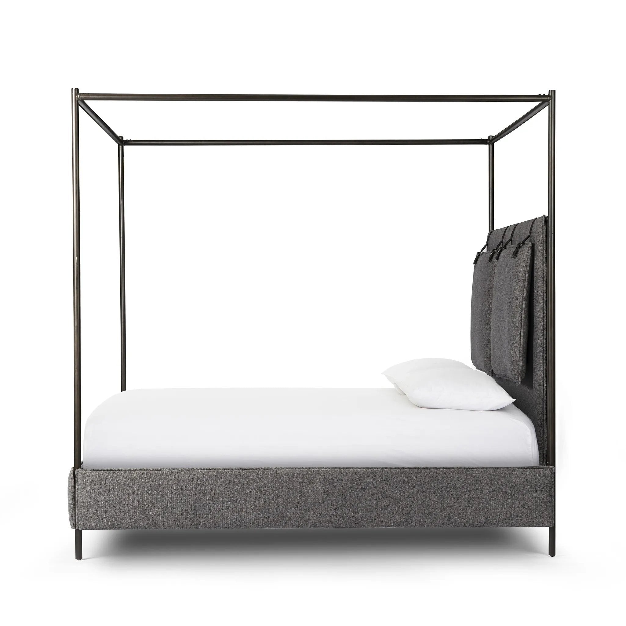 Featuring Leigh San Remo Ash Canopy Bed by Four Hands at Amethyst Home. Safari styling gets refreshed with ash grey fabric and leather straps that secure decorative suspended headboard pillows. Box spring required. This bed is not compatible with an adjustable mattress.KingOverall Dimensions: 80.75"w x 84.75"d x 82.25"hWeight: 212.74 lbsQueenOverall Dim. Amethyst Home provides interior design, new home construction design consulting, vintage area rugs, and lighting in the Newport Beach metro area.