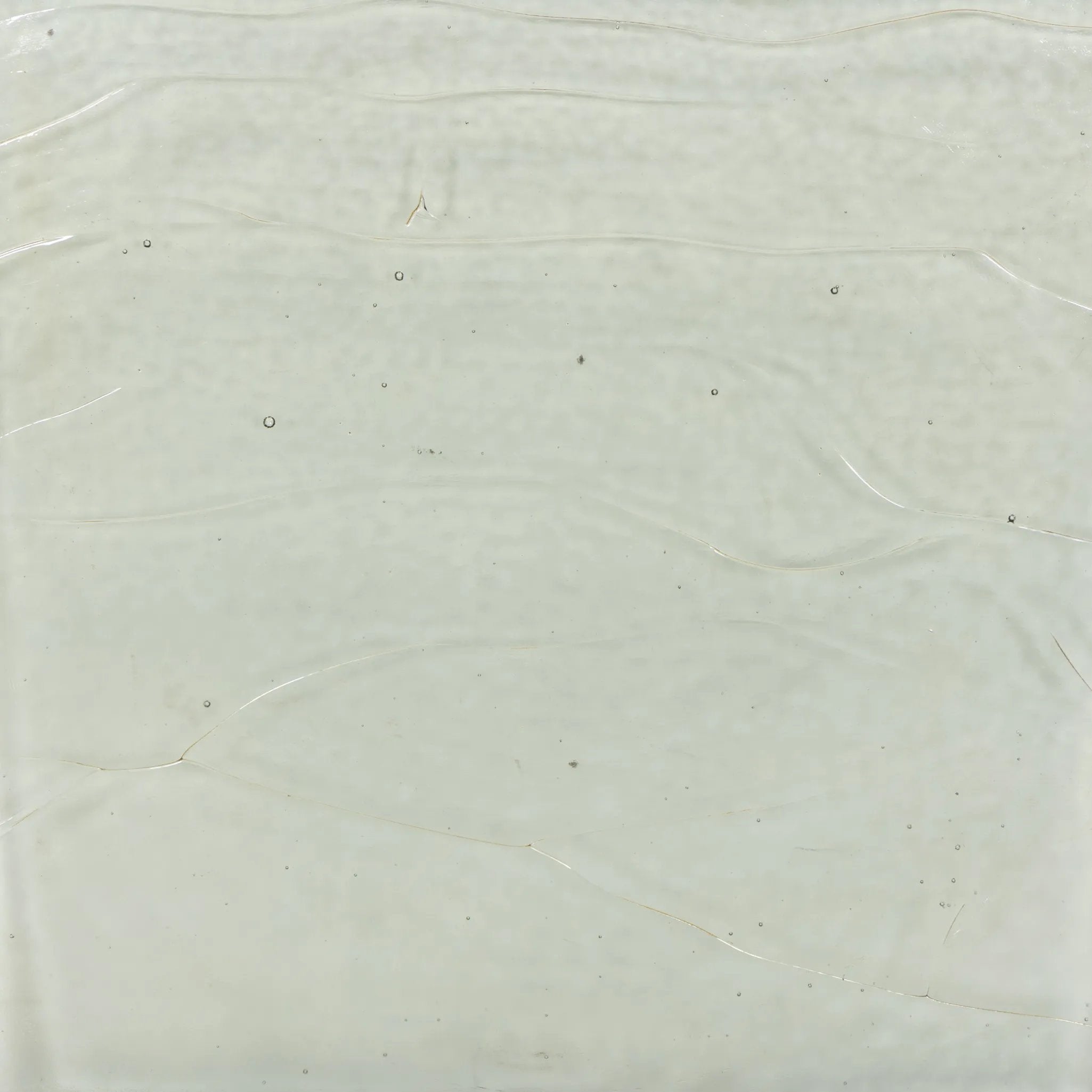 Featuring Lennie Clear Cast Glass Cast Glass Bunching Table by Four Hands at Amethyst Home. An airy, angular base of charcoal-burnished iron supports a squared tabletop of amber cast glass. Styles well alone or paired in multiples.Overall Dimensions: 25.00"w x 25.00"d x 15.75"hWeight : 120.06 lbsMaterials: Cast Glass, Iron. Amethyst Home provides interior design, new home construction design consulting, vintage area rugs, and lighting in the Des Moines metro area.