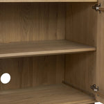 Made from rustic-finished oak with a plinth-style base, clean angles and linear reeding define this midcentury-spirited sideboard. Fully finished interior for a beautiful look inside and out. Designed in partnership with longtime Four Hands collaborator Thomas Bina and Brazilian designer Ronald Sasson Amethyst Home provides interior design, new home construction design consulting, vintage area rugs, and lighting in the Boston metro area.