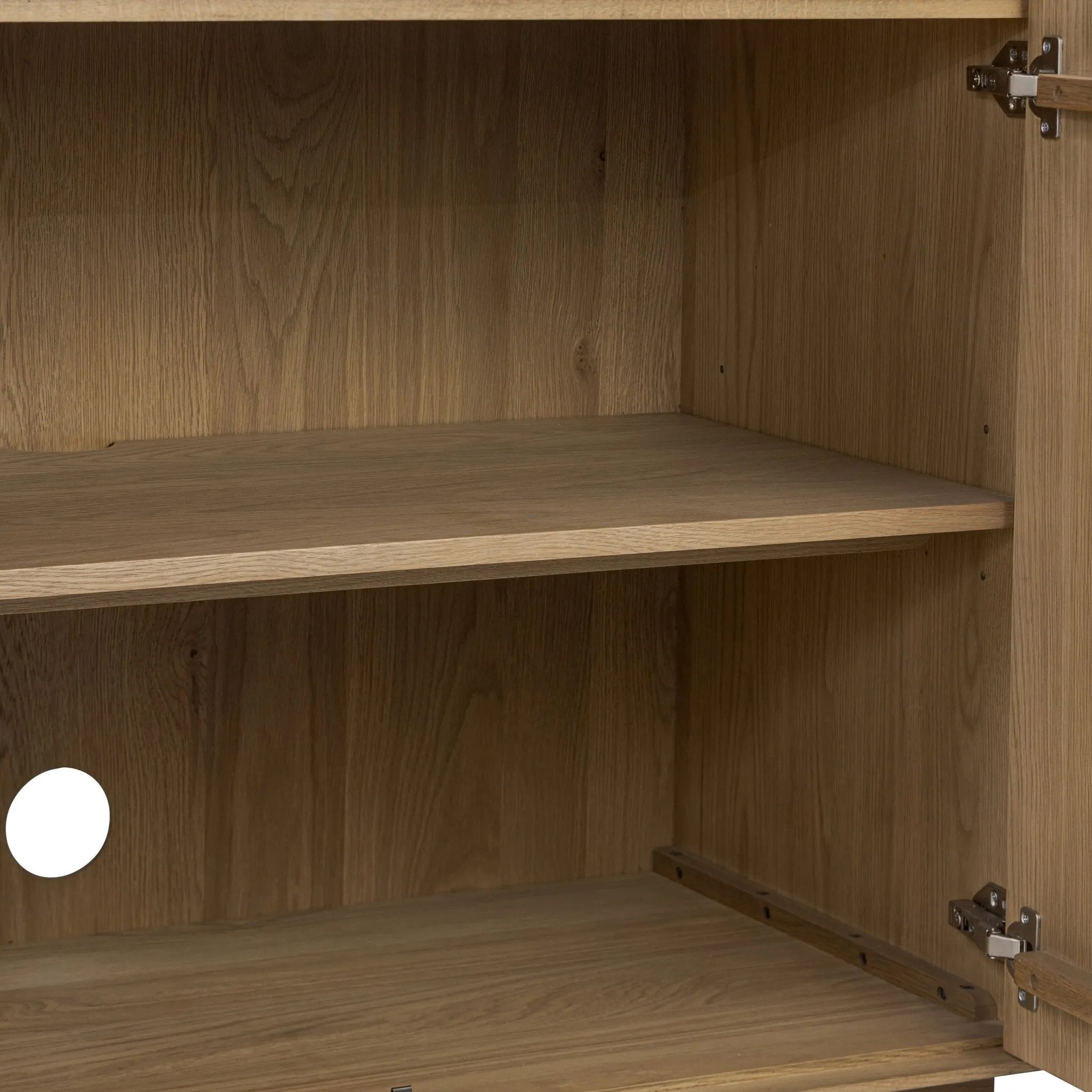 Made from rustic-finished oak with a plinth-style base, clean angles and linear reeding define this midcentury-spirited sideboard. Fully finished interior for a beautiful look inside and out. Designed in partnership with longtime Four Hands collaborator Thomas Bina and Brazilian designer Ronald Sasson Amethyst Home provides interior design, new home construction design consulting, vintage area rugs, and lighting in the Boston metro area.