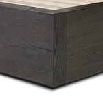 Featuring Leo Smoked Black Bed by Four Hands at Amethyst Home. Designed by Thomas Bina and Ronald Sasson, a design partnership blending both modern minimalist and Brazilian influences. Crafted from a mix of solid oak and thick-cut oak veneer, this clean-lined bed features vertical reed detailing on the tall headboard and beautiful horizontal graining on the fo. Amethyst Home provides interior design, new home construction design consulting, vintage area rugs, and lighting in the Austin metro area.