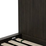 Featuring Leo Smoked Black Bed by Four Hands at Amethyst Home. Designed by Thomas Bina and Ronald Sasson, a design partnership blending both modern minimalist and Brazilian influences. Crafted from a mix of solid oak and thick-cut oak veneer, this clean-lined bed features vertical reed detailing on the tall headboard and beautiful horizontal graining on the. Amethyst Home provides interior design, new home construction design consulting, vintage area rugs, and lighting in the Calabasas metro area.