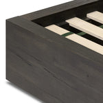 Featuring Leo Smoked Black Bed by Four Hands at Amethyst Home. Designed by Thomas Bina and Ronald Sasson, a design partnership blending both modern minimalist and Brazilian influences. Crafted from a mix of solid oak and thick-cut oak veneer, this clean-lined bed features vertical reed detailing on the tall headboard and beautiful horizontal graining on th. Amethyst Home provides interior design, new home construction design consulting, vintage area rugs, and lighting in the Des Moines metro area.