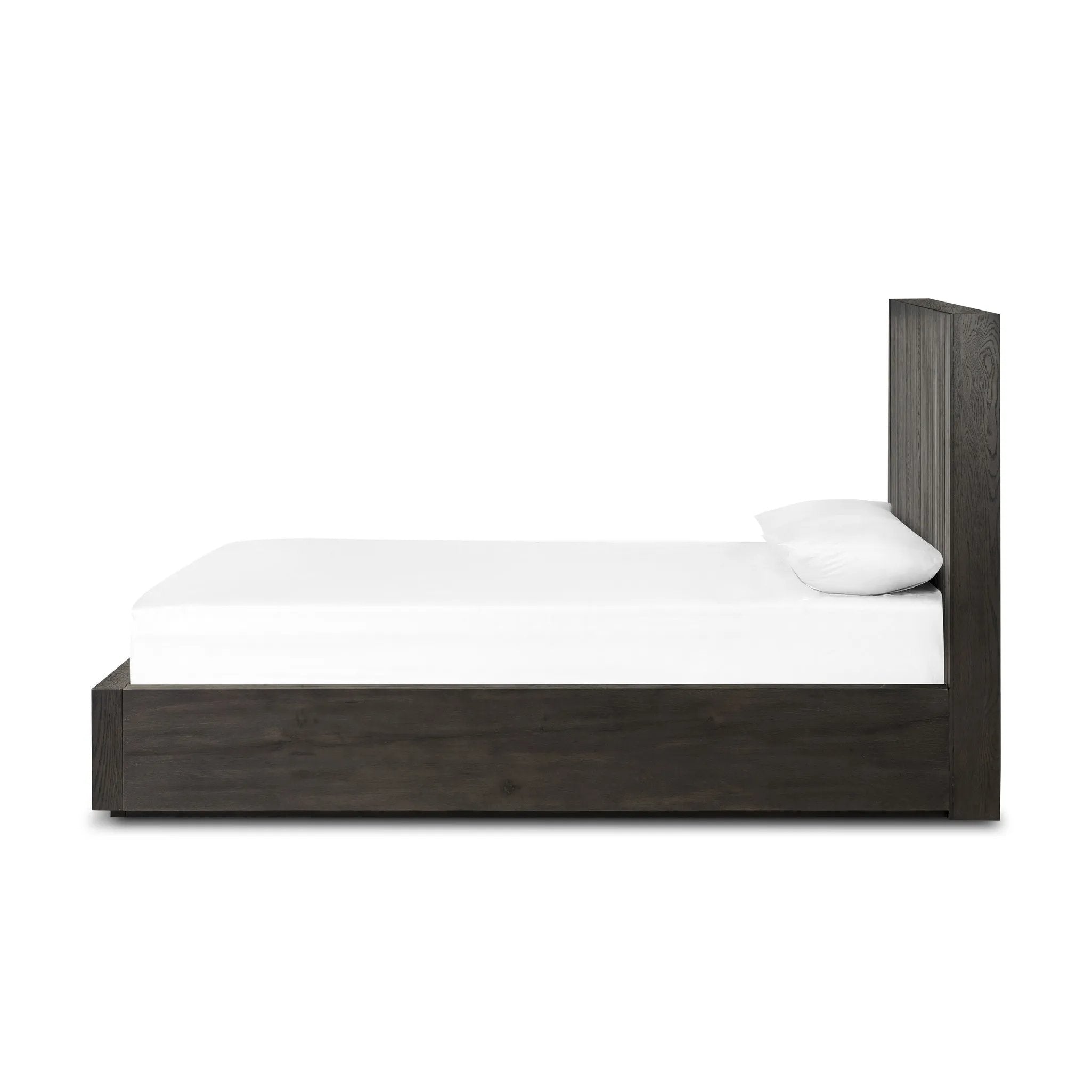Featuring Leo Smoked Black Bed by Four Hands at Amethyst Home. Designed by Thomas Bina and Ronald Sasson, a design partnership blending both modern minimalist and Brazilian influences. Crafted from a mix of solid oak and thick-cut oak veneer, this clean-lined bed features vertical reed detailing on the tall headboard and beautiful horizontal graining on the. Amethyst Home provides interior design, new home construction design consulting, vintage area rugs, and lighting in the Nashville metro area.