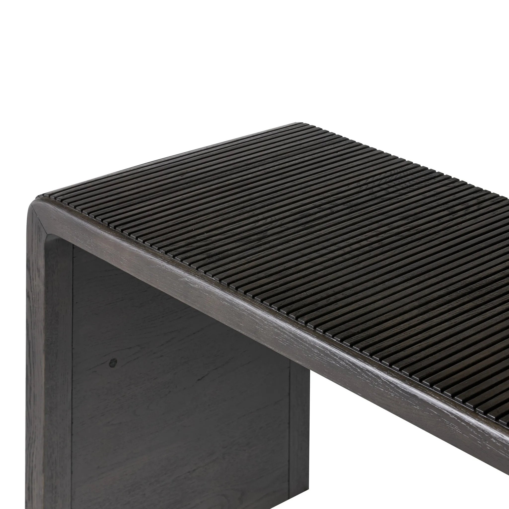 Featuring Leo Smoked Black Console Table by Four Hands at Amethyst Home. Smoked black oak shapes an elongated console table, rich with reeding. Subtly rounded edges reflect Brazilian midcentury inspiration behind this crafted minimalist piece. Designed in partnership with longtime Four Hands collaborator Thomas Bina and designer Ronald Sasson.Overall Dimen. Amethyst Home provides interior design, new home construction design consulting, vintage area rugs, and lighting in the Washington metro area.