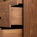 Make a subtle statement in your bedroom with a modern, architectural dresser. An exaggerated pedestal base of solid acacia supports a clean-lined case with nine roomy drawers. Iron hardware in an aged bronze finish the look.As enthusiasts of clean materials at Amethyst, we love the designer inspired Lilas 9 Drawer Dresser - Saddle Tan Veneer. Amethyst Home provides interior design, new home construction design consulting, vintage area rugs, and lighting in the Los Angeles metro area.