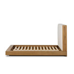 A woven, cushioned headboard in neutral cream adds texture around a floating platform base of light oak. Base features angular chamfered details, thick rails and footboard with a plinth base. Performance fabrics are specially created to withstand spills, stains, high traffic and wear, ensuring long-term comfort and unmatched durability Amethyst Home provides interior design, new home construction design consulting, vintage area rugs, and lighting in the Washington metro area.