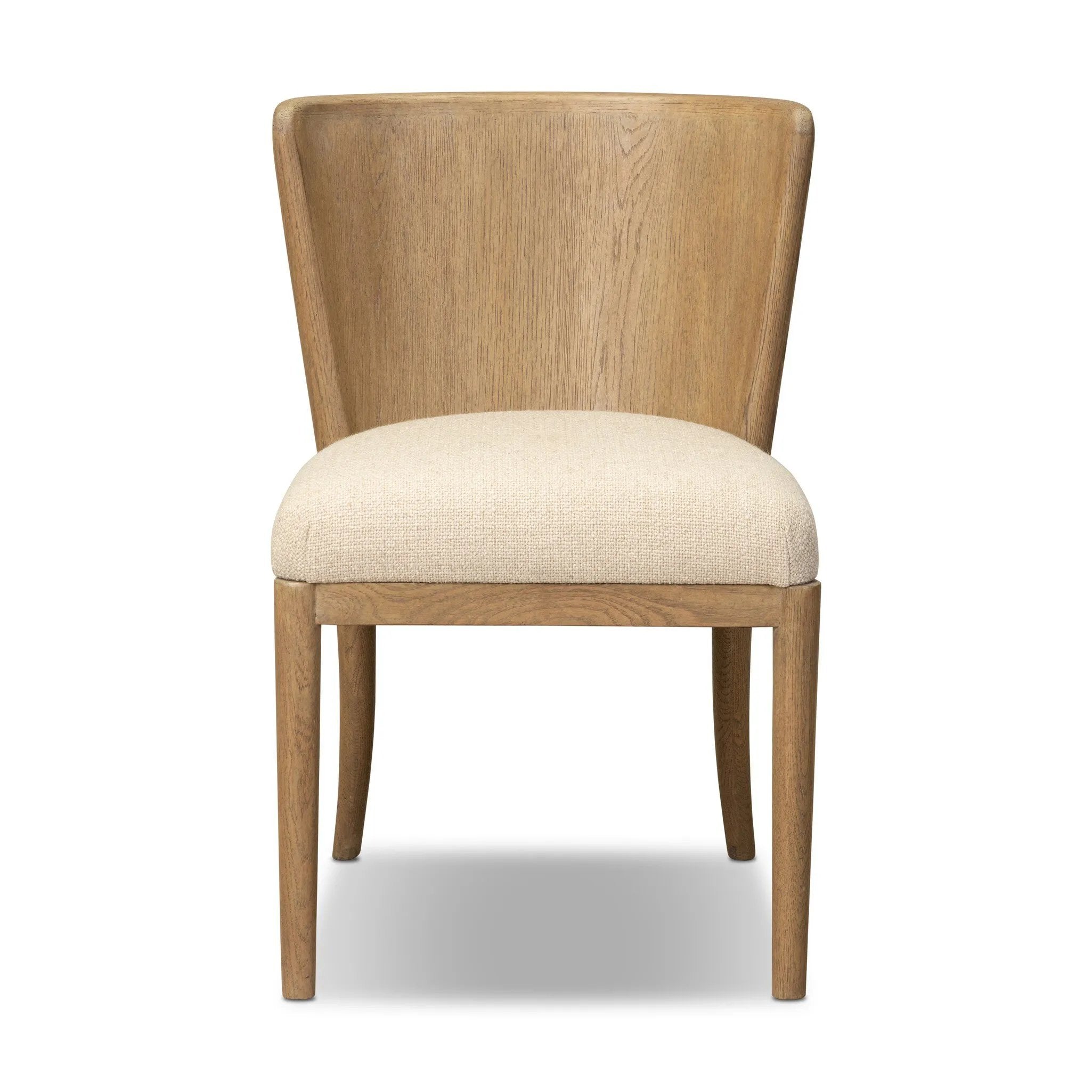 The barrel back dining chair, refreshed. Light oak shapes an armless frame and curved rear legs that almost appear to flow into the seat back. A comfy seat is upholstered in high-performance fabric, while reeding details on the back create a sense of perception play. Amethyst Home provides interior design, new home construction design consulting, vintage area rugs, and lighting in the Alpharetta metro area.