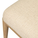 The barrel back dining chair, refreshed. Light oak shapes an armless frame and curved rear legs that almost appear to flow into the seat back. A comfy seat is upholstered in high-performance fabric, while reeding details on the back create a sense of perception play. Amethyst Home provides interior design, new home construction design consulting, vintage area rugs, and lighting in the Calabasas metro area.