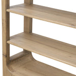 A clean, wide storage style crafted of aged natural oak brings a Brutalist look to any room. Plenty of open shelving offers endless options for favorite books and treasures, while a lower push-latch drawer finishes the look Amethyst Home provides interior design, new home construction design consulting, vintage area rugs, and lighting in the Austin metro area.