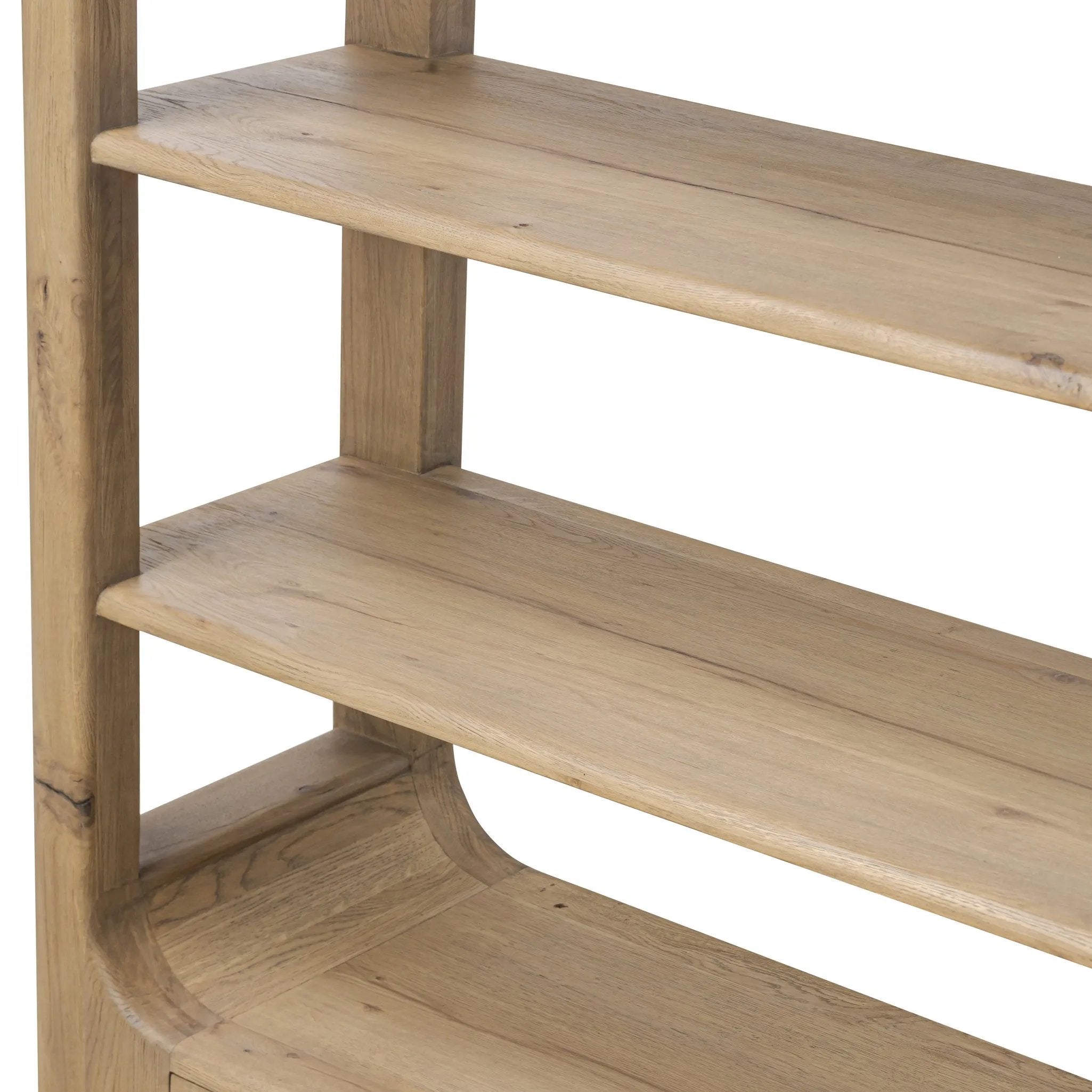 A clean, wide storage style crafted of aged natural oak brings a Brutalist look to any room. Plenty of open shelving offers endless options for favorite books and treasures, while a lower push-latch drawer finishes the look Amethyst Home provides interior design, new home construction design consulting, vintage area rugs, and lighting in the Austin metro area.