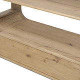 A clean, wide storage style crafted of aged natural oak brings a Brutalist look to any room. Plenty of open shelving offers endless options for favorite books and treasures, while a lower push-latch drawer finishes the look Amethyst Home provides interior design, new home construction design consulting, vintage area rugs, and lighting in the Des Moines metro area.