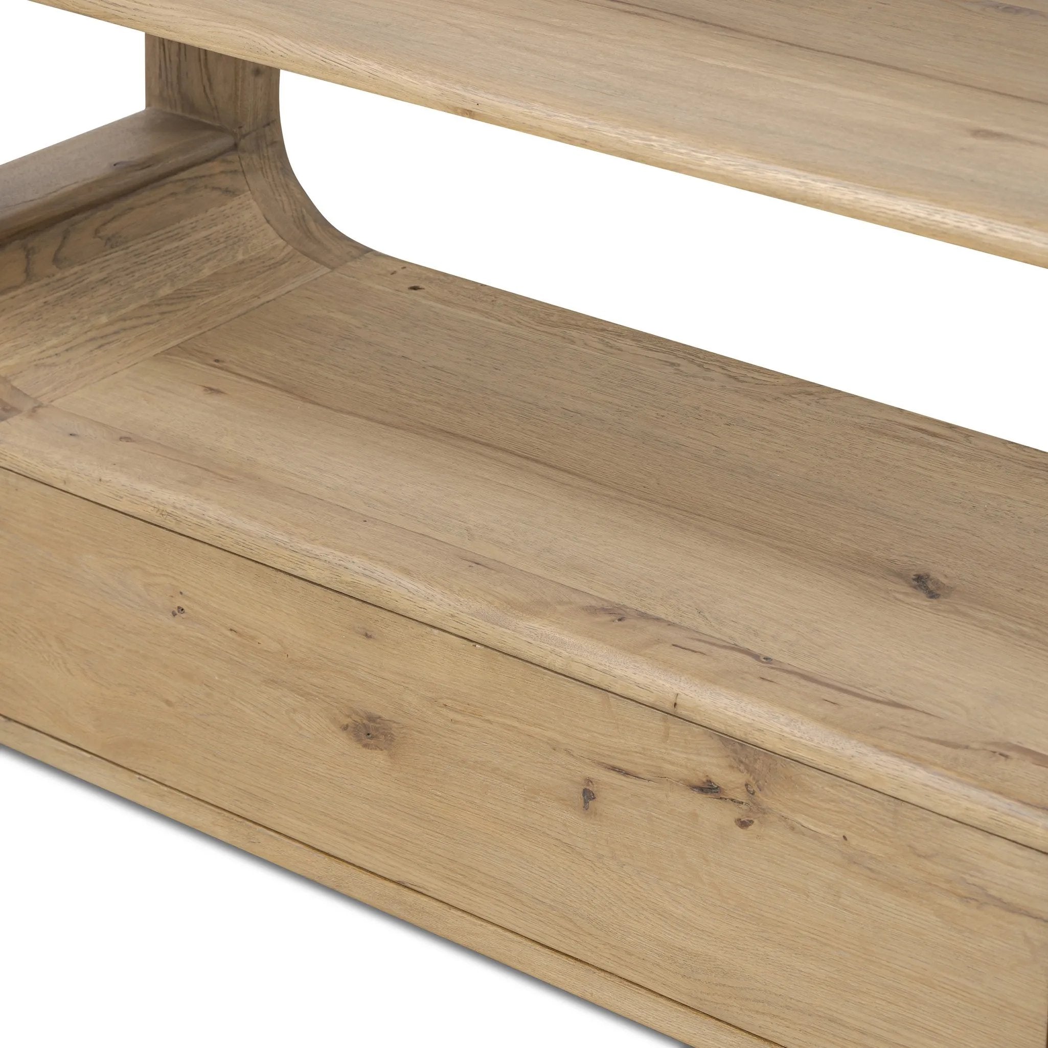 A clean, wide storage style crafted of aged natural oak brings a Brutalist look to any room. Plenty of open shelving offers endless options for favorite books and treasures, while a lower push-latch drawer finishes the look Amethyst Home provides interior design, new home construction design consulting, vintage area rugs, and lighting in the Des Moines metro area.