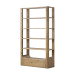 A clean, wide storage style crafted of aged natural oak brings a Brutalist look to any room. Plenty of open shelving offers endless options for favorite books and treasures, while a lower push-latch drawer finishes the look Amethyst Home provides interior design, new home construction design consulting, vintage area rugs, and lighting in the Nashville metro area.