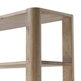 A clean, wide storage style crafted of aged natural oak brings a Brutalist look to any room. Plenty of open shelving offers endless options for favorite books and treasures, while a lower push-latch drawer finishes the look Amethyst Home provides interior design, new home construction design consulting, vintage area rugs, and lighting in the Portland metro area.