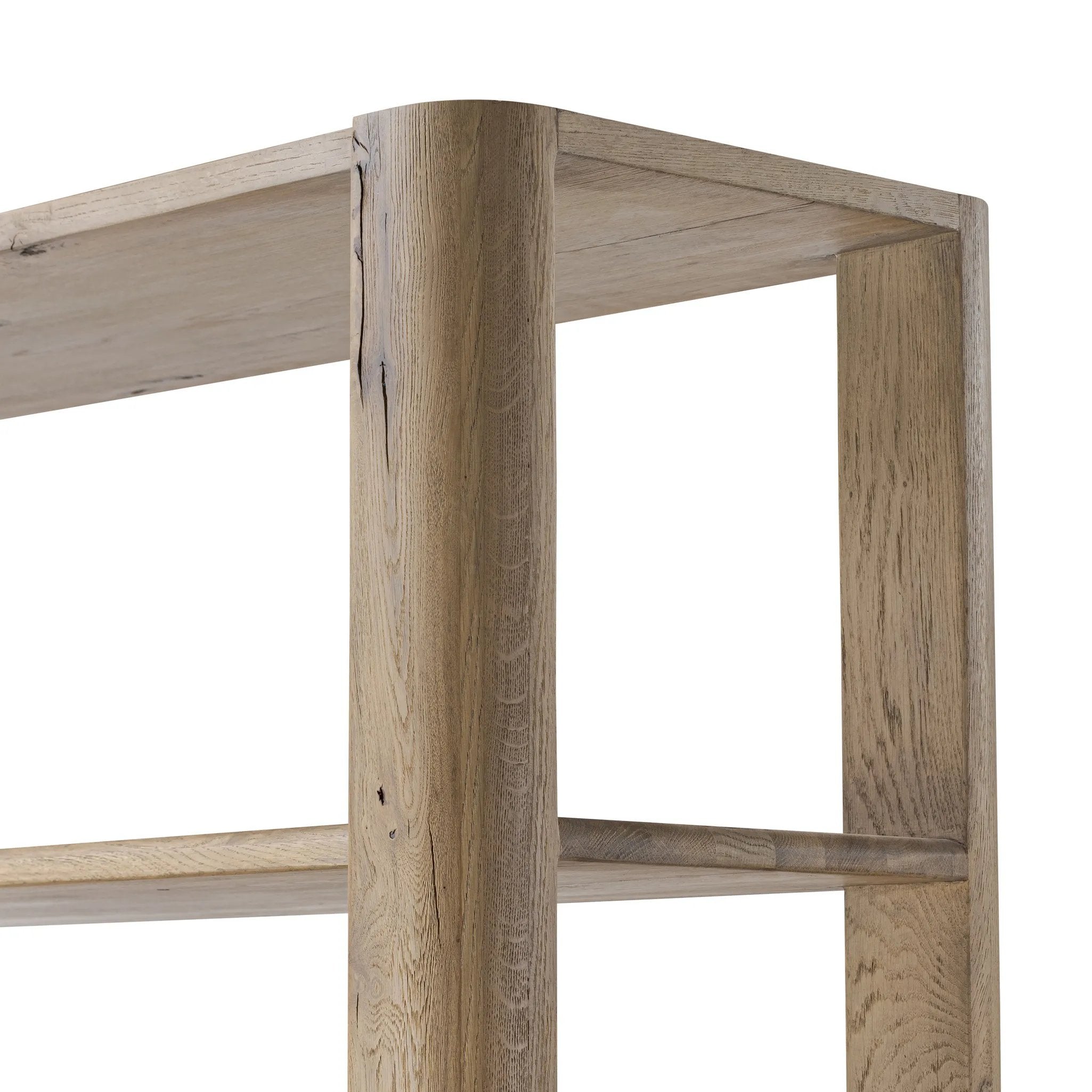 A clean, wide storage style crafted of aged natural oak brings a Brutalist look to any room. Plenty of open shelving offers endless options for favorite books and treasures, while a lower push-latch drawer finishes the look Amethyst Home provides interior design, new home construction design consulting, vintage area rugs, and lighting in the Portland metro area.