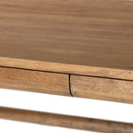 Featuring Lorik Caramel Rubberwood Desk by Four Hands at Amethyst Home. Wabi Sabi-inspired and designed with a clean, bold shape. This rustic desk features a modernized shape crafted from caramel-finished wood. Designed with cylindrical legs that are both angled and tapered for added movement. Built-in, hidden pencil drawers keep the focus on the natural grai. Amethyst Home provides interior design, new home construction design consulting, vintage area rugs, and lighting in the Houston metro area.