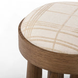 A simple, charming stool with natural oak wood veneer finish and a seat upholstered in a traditional ivory fabric with a classic box pattern. Tapered legs add subtle character.As lovers of clean design at Amethyst, we love the optimistic inspired Louise Accent Stool - Sheffield Ivory. Amethyst Home provides interior design, new home construction design consulting, vintage area rugs, and lighting in the Des Moines metro area.