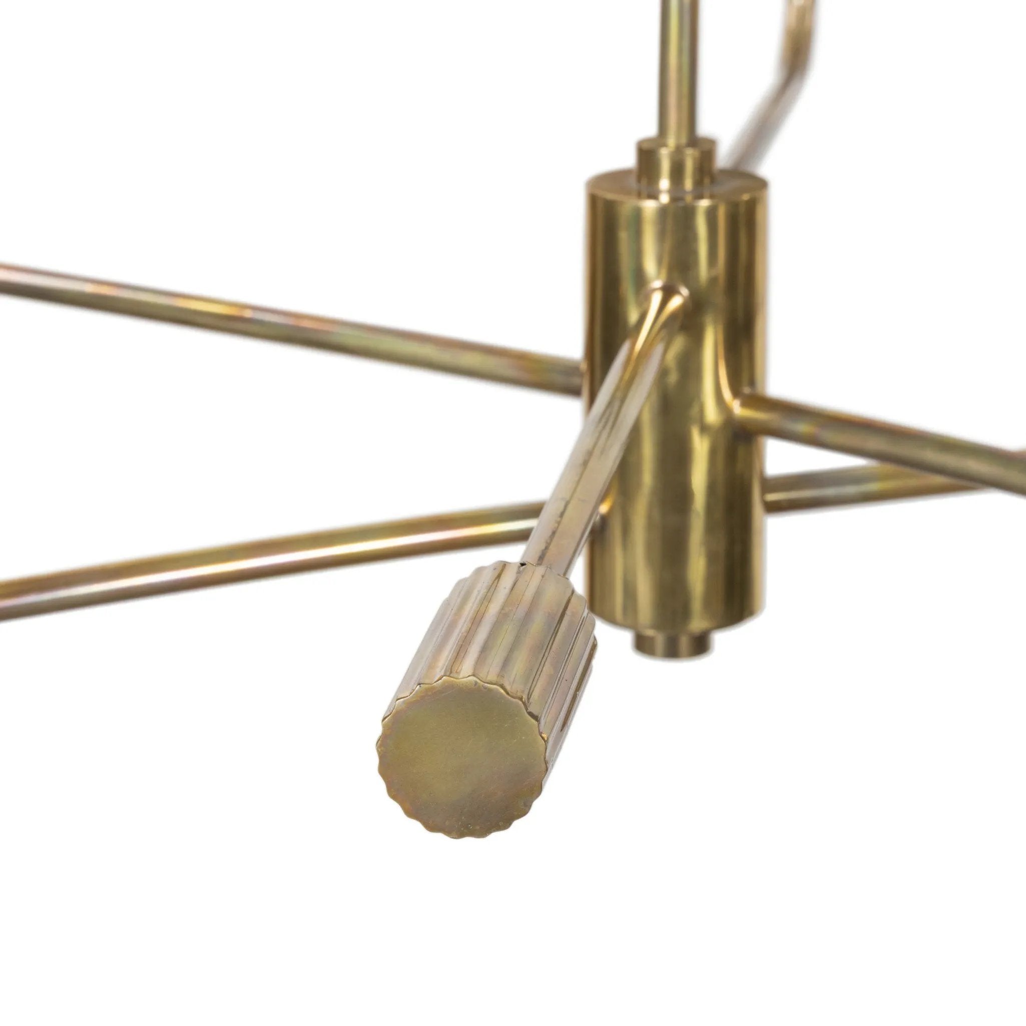 Artfully diffused lighting inspired by 1920s glam. Three glowing discs nestle within curved brass reflectors, creating a warm, expansive ambiance. Reeding detail on the socket and stem add texture, while a hand-burnt brass finish ensures each piece ages uniquely, developing character over time Amethyst Home provides interior design, new home construction design consulting, vintage area rugs, and lighting in the Alpharetta metro area.