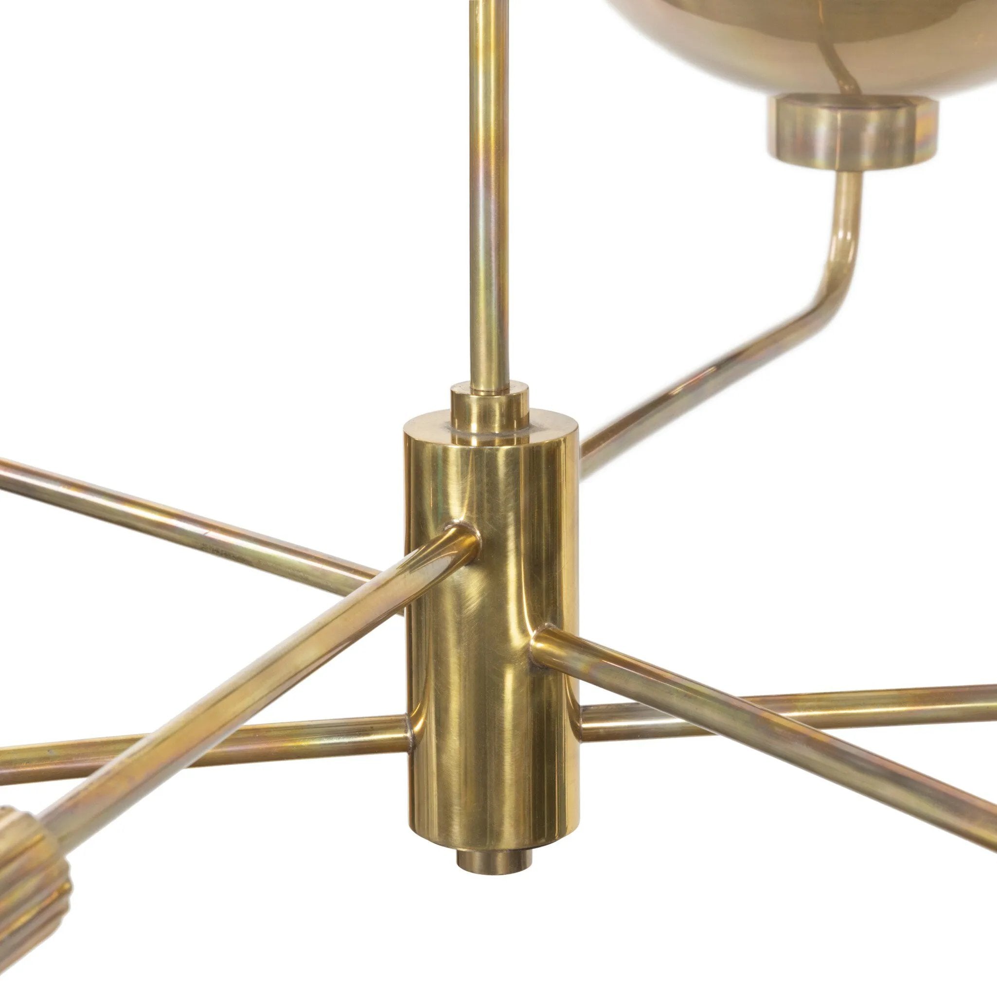 Artfully diffused lighting inspired by 1920s glam. Three glowing discs nestle within curved brass reflectors, creating a warm, expansive ambiance. Reeding detail on the socket and stem add texture, while a hand-burnt brass finish ensures each piece ages uniquely, developing character over time Amethyst Home provides interior design, new home construction design consulting, vintage area rugs, and lighting in the Boston metro area.