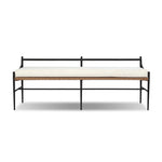 A modern take on traditional weaving patterns centers this outdoor dining bench. Subtly arched metal framing details and a relaxed knife-edge seat cushion invite softness. Cover or store inside during inclement weather and when not in use. A design collaboration by Amber Lewis and Four Hands. Amethyst Home provides interior design, new home construction design consulting, vintage area rugs, and lighting in the Miami metro area.
