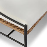 A modern take on traditional weaving patterns centers this outdoor dining bench. Subtly arched metal framing details and a relaxed knife-edge seat cushion invite softness. Cover or store inside during inclement weather and when not in use. A design collaboration by Amber Lewis and Four Hands. Amethyst Home provides interior design, new home construction design consulting, vintage area rugs, and lighting in the Washington metro area.