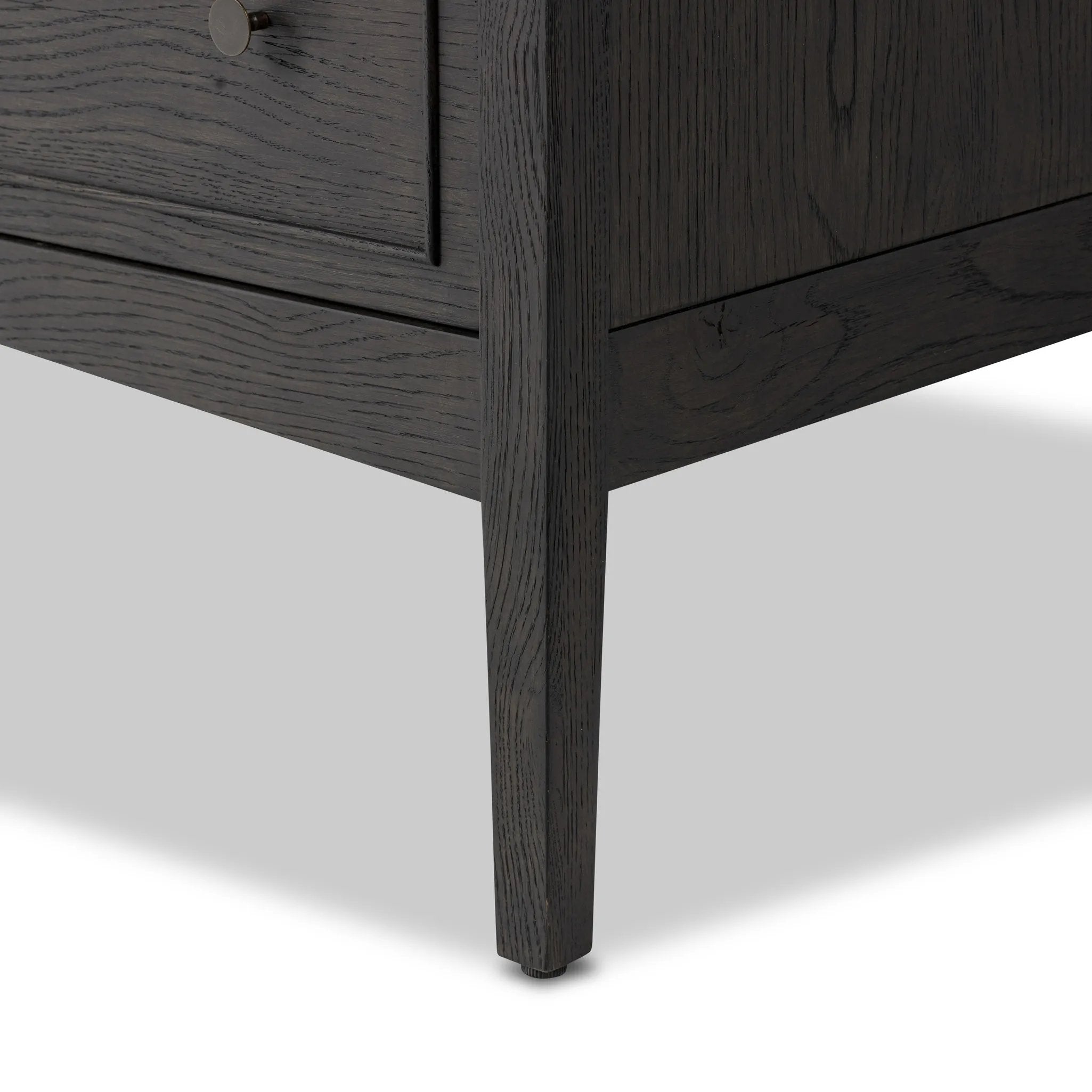 Featuring Maggie Smoked Black Oak Veneer 6 Drawer Dresser by Four Hands at Amethyst Home. A cleanly shaped six-drawer dresser is crafted from smoked black oak, highlighting the wood's natural grain. Roomy drawers offer plenty of space for bedroom storage, while the slim, tapered legs give the piece a subtle lift, creating a grounded look.Overall Dimensions. Amethyst Home provides interior design, new home construction design consulting, vintage area rugs, and lighting in the Des Moines metro area.