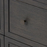 Featuring Maggie Smoked Black Oak Veneer 6 Drawer Dresser by Four Hands at Amethyst Home. A cleanly shaped six-drawer dresser is crafted from smoked black oak, highlighting the wood's natural grain. Roomy drawers offer plenty of space for bedroom storage, while the slim, tapered legs give the piece a subtle lift, creating a grounded look.Overall Dimensions: . Amethyst Home provides interior design, new home construction design consulting, vintage area rugs, and lighting in the Monterey metro area.