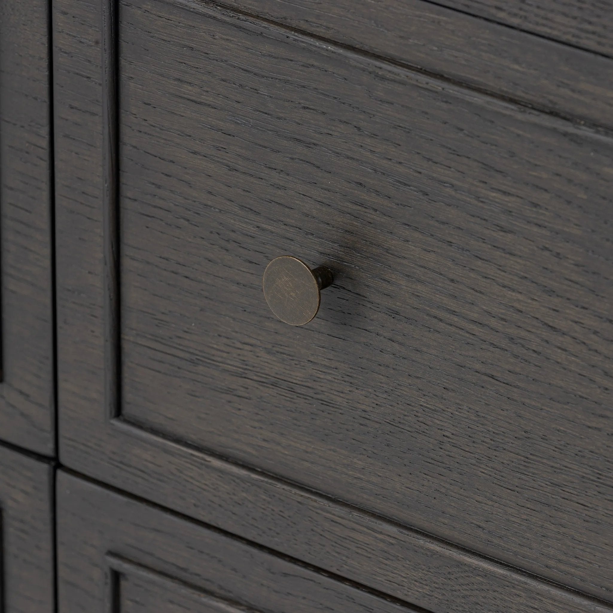 Featuring Maggie Smoked Black Oak Veneer 6 Drawer Dresser by Four Hands at Amethyst Home. A cleanly shaped six-drawer dresser is crafted from smoked black oak, highlighting the wood's natural grain. Roomy drawers offer plenty of space for bedroom storage, while the slim, tapered legs give the piece a subtle lift, creating a grounded look.Overall Dimensions: . Amethyst Home provides interior design, new home construction design consulting, vintage area rugs, and lighting in the Monterey metro area.