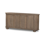A smaller scale and antique-inspired oval shape give this sideboard a classic polished look. A slight overhang of the top and bottom slabs adds visual interest, while simple ball-shaped hardware mimics this sideboard's unique bun feet. Amethyst Home provides interior design, new home construction design consulting, vintage area rugs, and lighting in the Kansas City metro area.