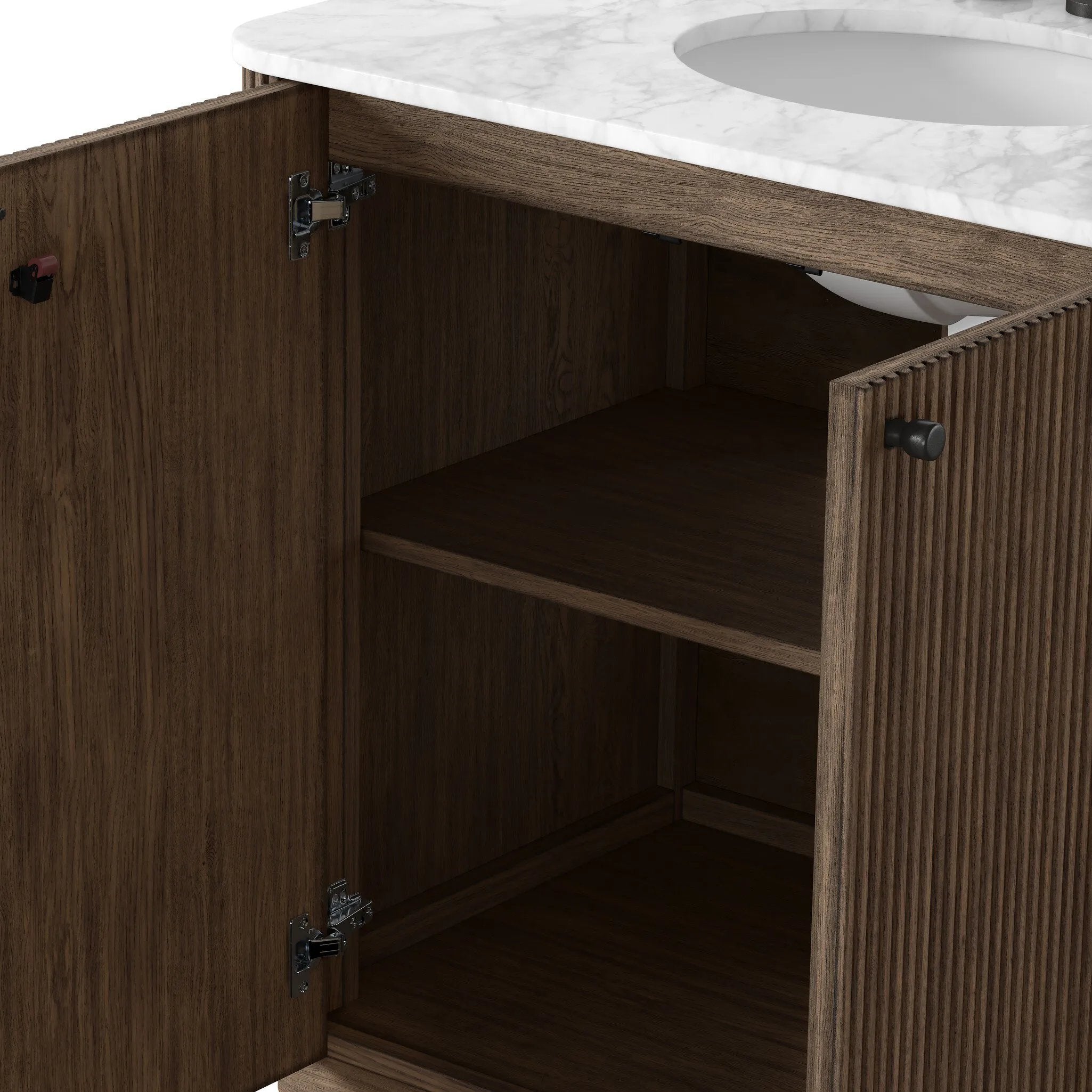 This bath vanity is simply shaped to allow the reeded oak to shine. Rounded corners bring softness and allow for a seamless finish, complemented by tapered knob hardware. Finished with a bath-safe sealant for moisture resistance. Designed to accommodate 8”-widespread faucets and standard-size hardware for easy customization. Amethyst Home provides interior design, new home construction design consulting, vintage area rugs, and lighting in the Park City metro area.