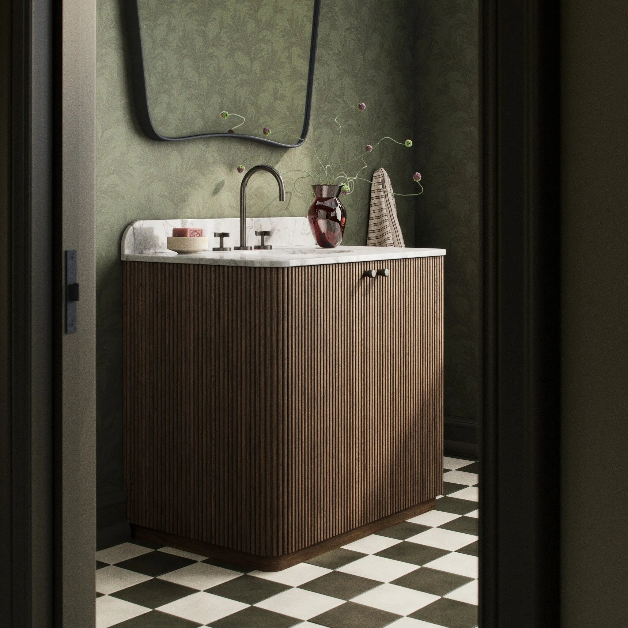 This bath vanity is simply shaped to allow the reeded oak to shine. Rounded corners bring softness and allow for a seamless finish, complemented by tapered knob hardware. Finished with a bath-safe sealant for moisture resistance. Designed to accommodate 8”-widespread faucets and standard-size hardware for easy customization. Amethyst Home provides interior design, new home construction design consulting, vintage area rugs, and lighting in the Scottsdale metro area.