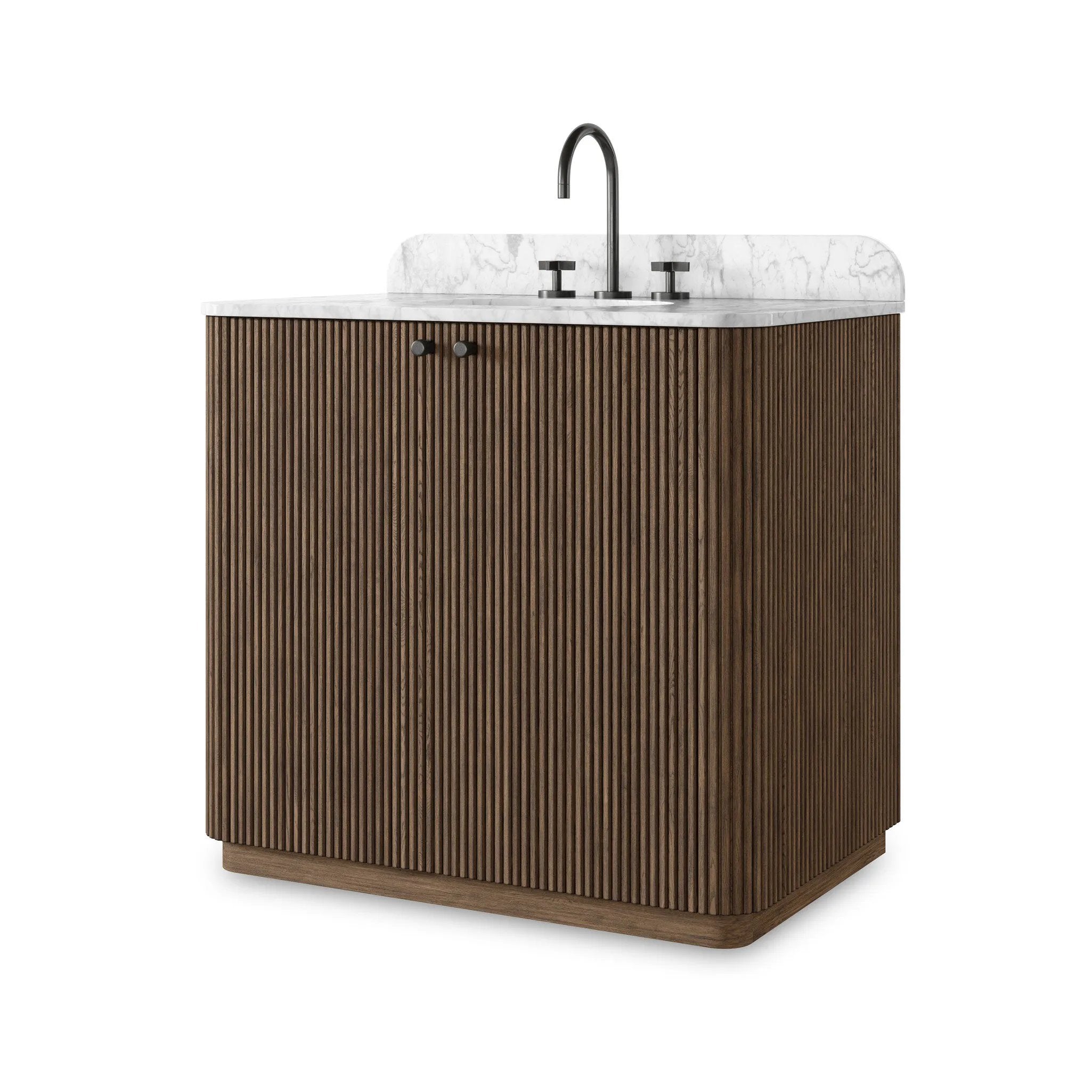 This bath vanity is simply shaped to allow the reeded oak to shine. Rounded corners bring softness and allow for a seamless finish, complemented by tapered knob hardware. Finished with a bath-safe sealant for moisture resistance. Designed to accommodate 8”-widespread faucets and standard-size hardware for easy customization. Amethyst Home provides interior design, new home construction design consulting, vintage area rugs, and lighting in the Tampa metro area.