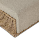 A fresh, playful take on the outdoor ottoman, featuring a woven cradle frame that wraps around the deep upholstered seat for added texture, dimension and contrast. The cushion is intentionally firm for a structured feel, meaning this piece can also be used as a coffee table. Cover or store inside during inclement weather and when not in use. Amethyst Home provides interior design, new home construction design consulting, vintage area rugs, and lighting in the Calabasas metro area.