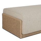 A fresh, playful take on the outdoor ottoman, featuring a woven cradle frame that wraps around the deep upholstered seat for added texture, dimension and contrast. The cushion is intentionally firm for a structured feel, meaning this piece can also be used as a coffee table. Cover or store inside during inclement weather and when not in use. Amethyst Home provides interior design, new home construction design consulting, vintage area rugs, and lighting in the Houston metro area.
