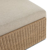 A fresh, playful take on the outdoor ottoman, featuring a woven cradle frame that wraps around the deep upholstered seat for added texture, dimension and contrast. The cushion is intentionally firm for a structured feel, meaning this piece can also be used as a coffee table. Cover or store inside during inclement weather and when not in use. Amethyst Home provides interior design, new home construction design consulting, vintage area rugs, and lighting in the Scottsdale metro area.