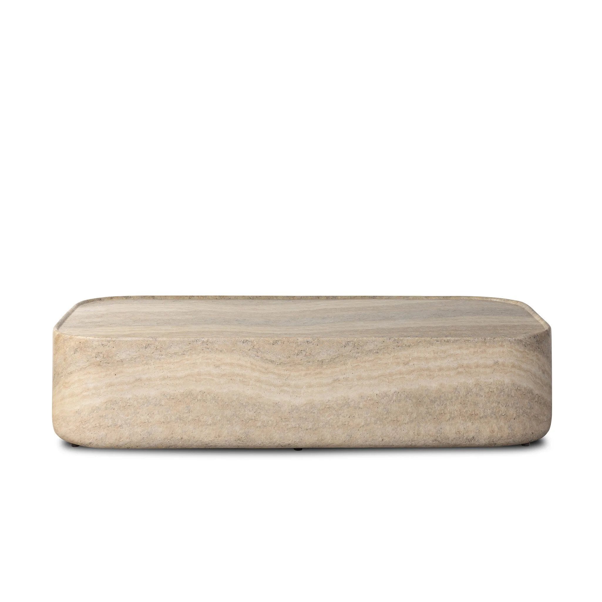 Simple shaping gets an elevated update with a classic plinth base mirrored in a lip detail around the tabletop. The rounded corners of this outdoor coffee table showcase textured sandy grey concrete, designed to mimic the detail found in natural stone. Cover or store indoors during inclement weather and when not in use. Amethyst Home provides interior design, new home construction design consulting, vintage area rugs, and lighting in the Scottsdale metro area.