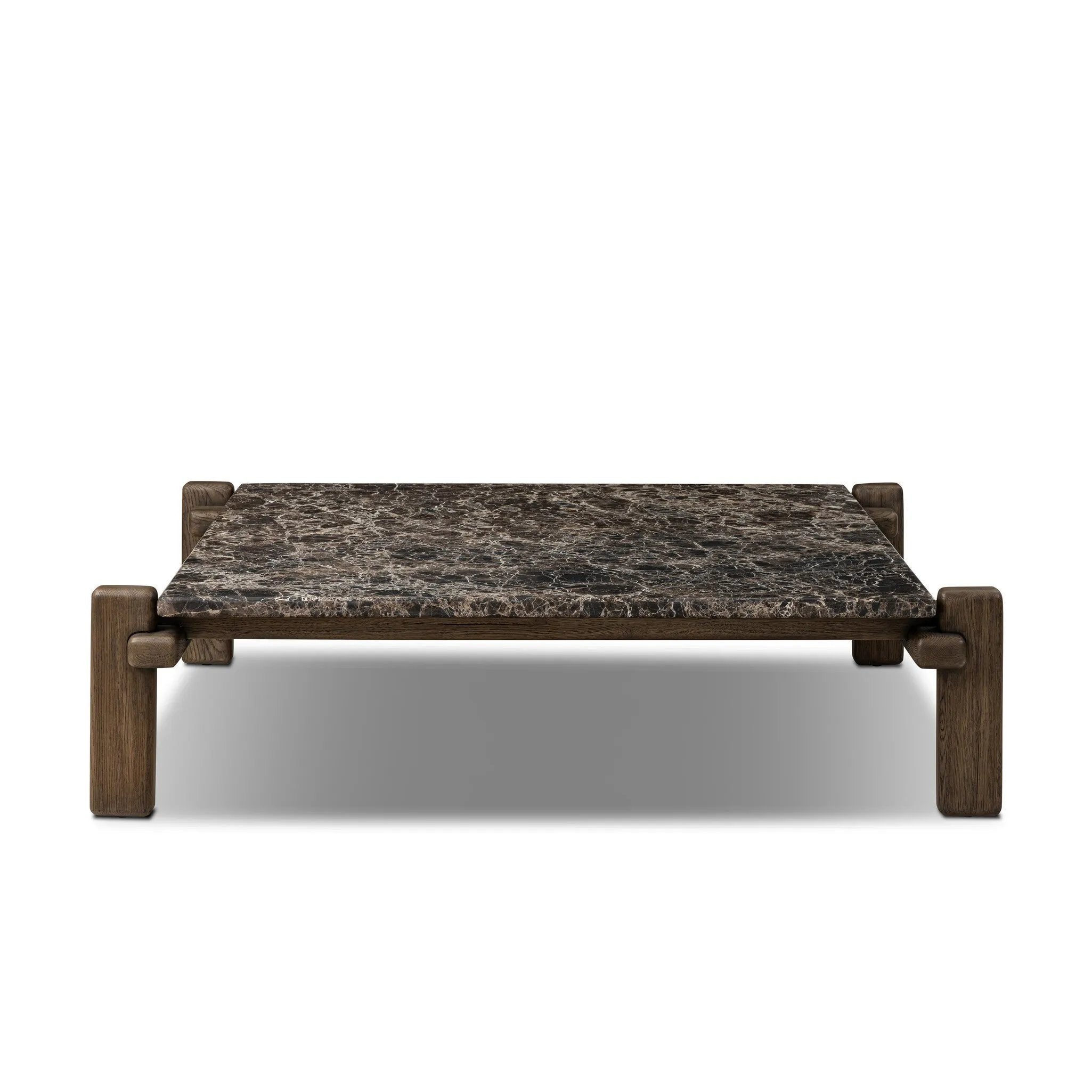 Designed by Thomas Bina and Ronald Sasson, a design partnership blending both modern minimalist and Brazilian influences. Mixed materials elevate the traditional coffee table, pairing solid reclaimed oak and solid marble, with overstated joint details. Rounded edges bring a soft, playful feel to the entire piece. Amethyst Home provides interior design, new home construction design consulting, vintage area rugs, and lighting in the Salt Lake City metro area.