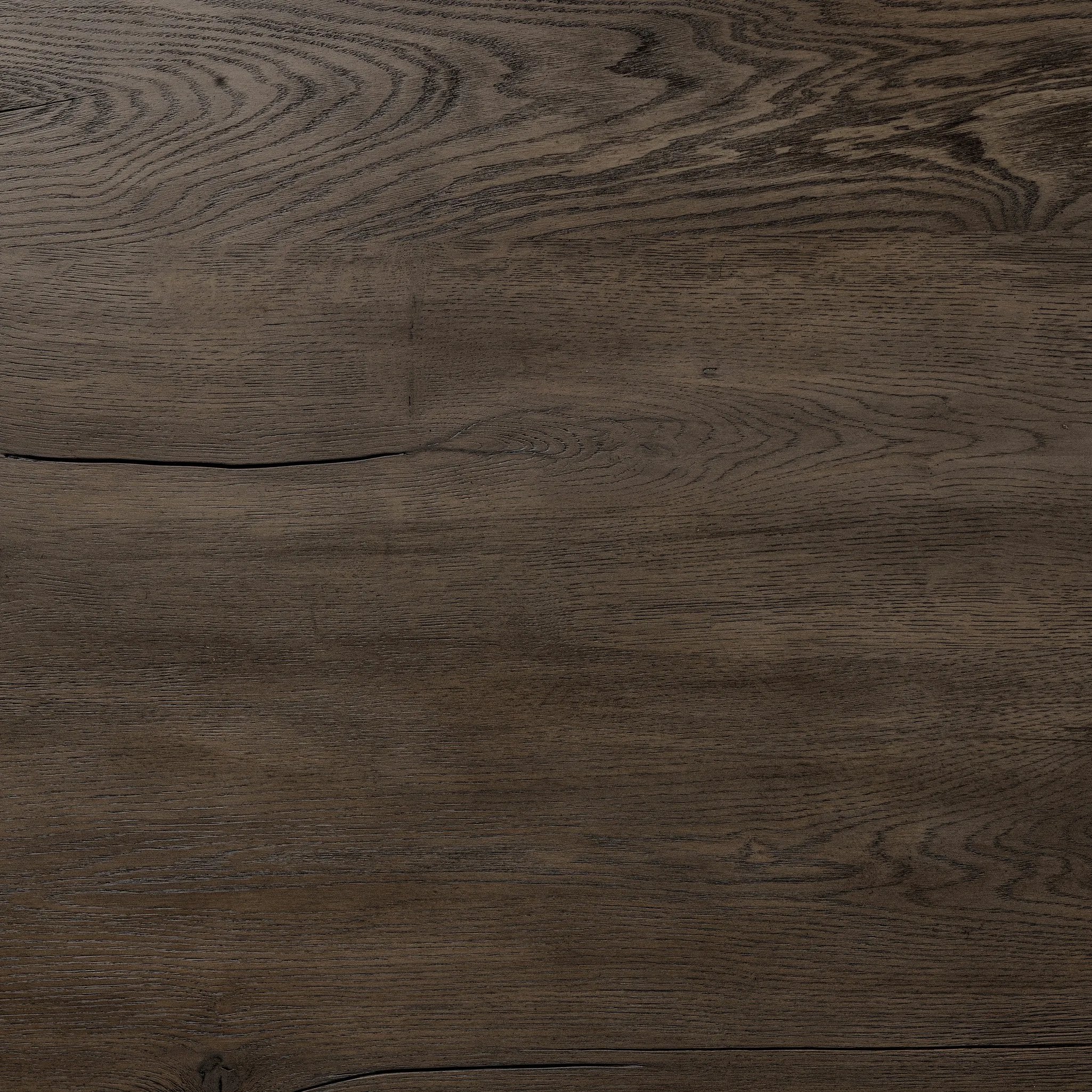 Designed by Thomas Bina and Ronald Sasson, a design partnership blending both modern minimalist and Brazilian influences. Grand-scale dining table is crafted from natural reclaimed French oak with tapered pedestal panels connected at the base Amethyst Home provides interior design, new home construction design consulting, vintage area rugs, and lighting in the Monterey metro area.