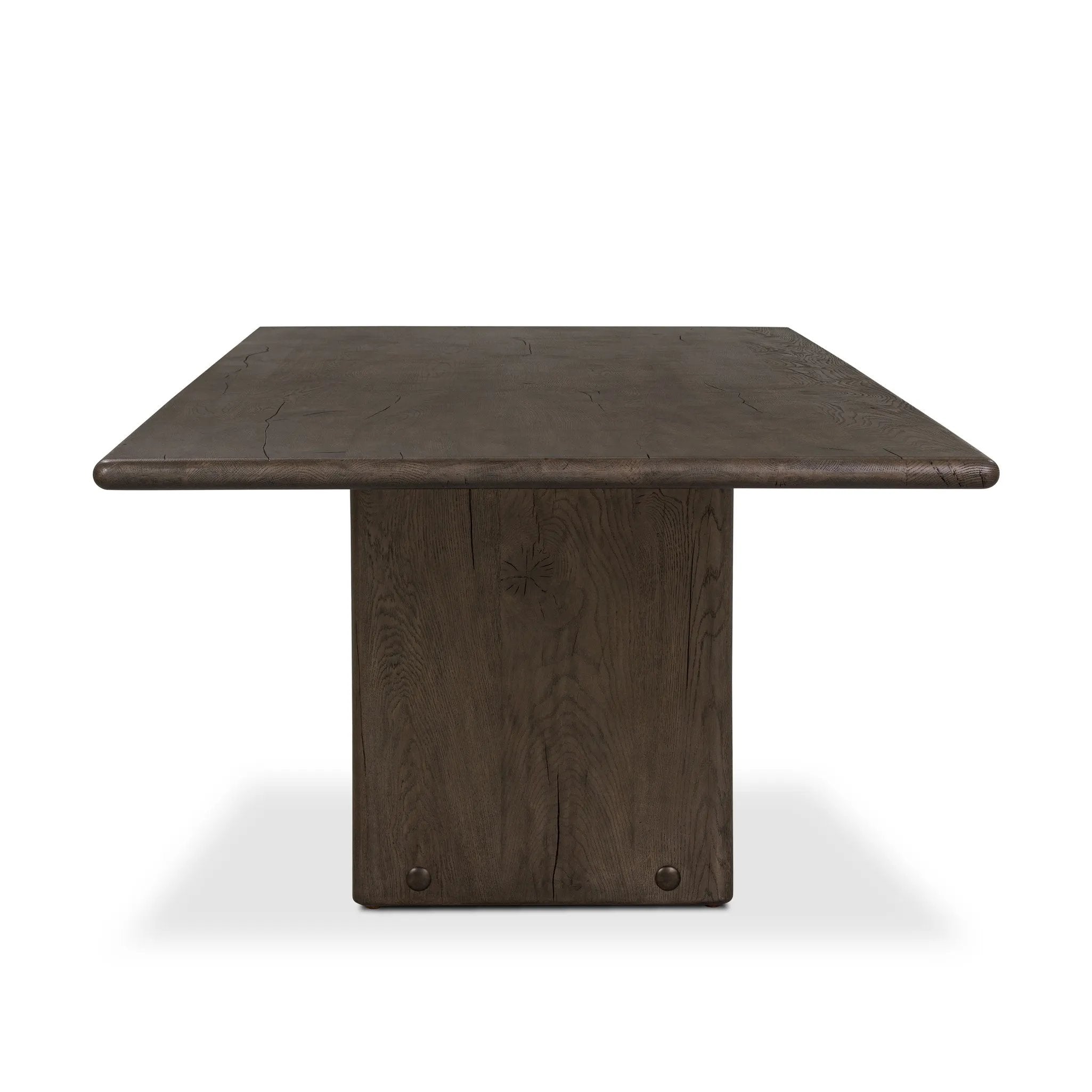 Designed by Thomas Bina and Ronald Sasson, a design partnership blending both modern minimalist and Brazilian influences. Grand-scale dining table is crafted from natural reclaimed French oak with tapered pedestal panels connected at the base Amethyst Home provides interior design, new home construction design consulting, vintage area rugs, and lighting in the Omaha metro area.