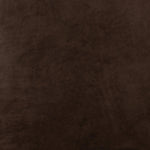 Modern wingback with a twist of barrel back design, this enveloping swivel chair comes with velvety upholstery in a deep brow