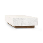 A white Carrara marble slab, rich with veining and movement. Supported by a wooden plinth, marble takes the spotlight in a design that's simple and sophisticated at once.Collection: Hughe Amethyst Home provides interior design, new home construction design consulting, vintage area rugs, and lighting in the Dallas metro area.